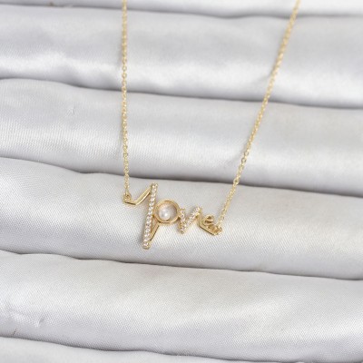 Pirinç Gold Renk Kalp Ritmi Model Kadın Kolye